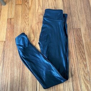 Size small faux leather leggings. Never worn